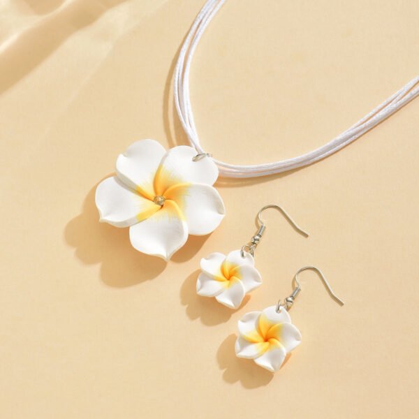 0c46af83b952401cbda0b9ecfcb2852b-goods.jpeg Tropical Bloom Jewelry Set Plumeria Earrings & Necklace Duo