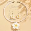 2ed1ef95caf84abc9e9b45bc2e986e86-goods.jpeg Tropical Bloom Jewelry Set Plumeria Earrings & Necklace Duo