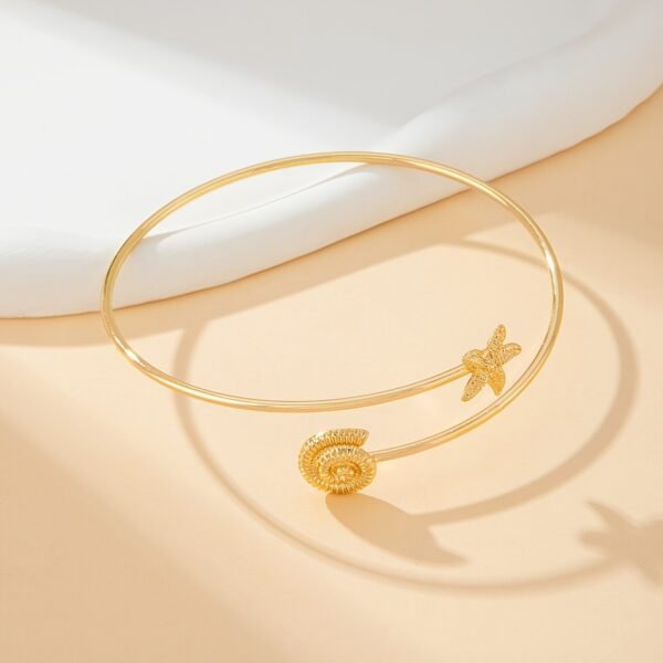 30862d34-e38f-4b08-a6c4-1abdc7461f62.jpg Ocean Glow Arm Cuff Adjustable Minimalist Statement