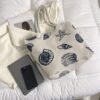 32aad5c0aa379ea69ef72ad14d8029cb.jpg Shell Pattern Canvas Tote Bag