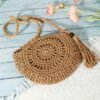39efba15b62e1ffcb4e123e5fffb5009.jpg Boho Luxe Round Cutout Bag Handcrafted Crossbody Statement Piece