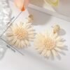 67f398b6-7c2c-49b9-acc9-feb95ae70877.jpg 1 Pair Boho Chic Handwoven Daisy Earrings for Women