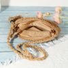9bc36de514eef9d23b855e867c62594a.jpg Boho Luxe Round Cutout Bag Handcrafted Crossbody Statement Piece