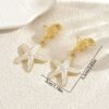 bd8a91ba-143e-4d7c-9288-3e3dac65e21e.jpg Ocean Muse Drop Earrings Starfish & Shell Statement Pair