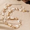 d0dd0a52-a5b3-478c-aec9-1bcc43db2861.jpg Bohemian Style Braided Cord Sea Star and Shell Decorative Summer Beach Necklace
