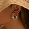 fe8b31c5-27c2-497a-8c56-a00de9ef0b23.jpg Set of 2 Bohemian-Inspired Handcrafted Earrings Featuring Woven Baroque Pearls